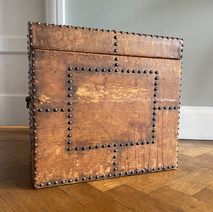 A stunning leather clad and brass studded Wine Chest with a great aged look, wear and colour. It has a hinged and barrel top with sturdy brass handle on each side. Inside sees an inner metal bin with handy handles making it easy to remove. Will hold 12 bottles of wine - SHOP NOW - www.intovintage.co.uk