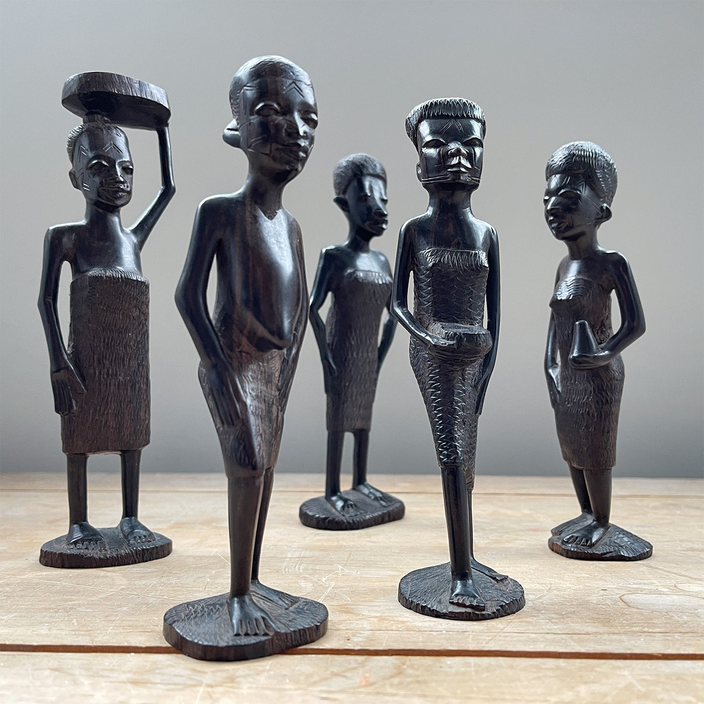 A group of five Carved African Tribal Figures full of Wonderful detail and expression. Expertly carved from ebony wood  - SHOP NOW - www.intovintage.co.uk