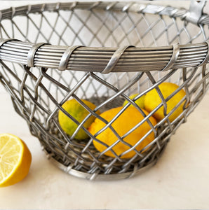 A Vintage Basket. Made of aluminium wire making it very sturdy. Use it for fruit or, line it with a smart napkin and serve some rustic bread in it - SHOP NOW - www.intovintage.co.uk