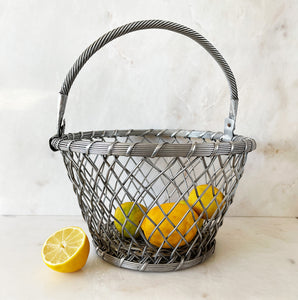 A Vintage Basket. Made of aluminium wire making it very sturdy. Use it for fruit or, line it with a smart napkin and serve some rustic bread in it - SHOP NOW - www.intovintage.co.uk