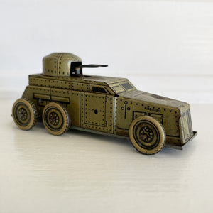 A Cool little Pre-War 1930s Kellerman tin-plate clockwork Panzerspahwagen Armoured Car. It has a clockwork movement, that when wound propels the car forward and shoots bright sparks out of the gun turret. Marked 'D.R.G.M' just under the key hole and 'FOREIGN' above the front wheel - SHOP NOW - www.intovintage.co.uk