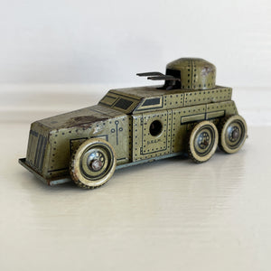 A Cool little Pre-War 1930s Kellerman tin-plate clockwork Panzerspahwagen Armoured Car. It has a clockwork movement, that when wound propels the car forward and shoots bright sparks out of the gun turret. Marked 'D.R.G.M' just under the key hole and 'FOREIGN' above the front wheel - SHOP NOW - www.intovintage.co.uk