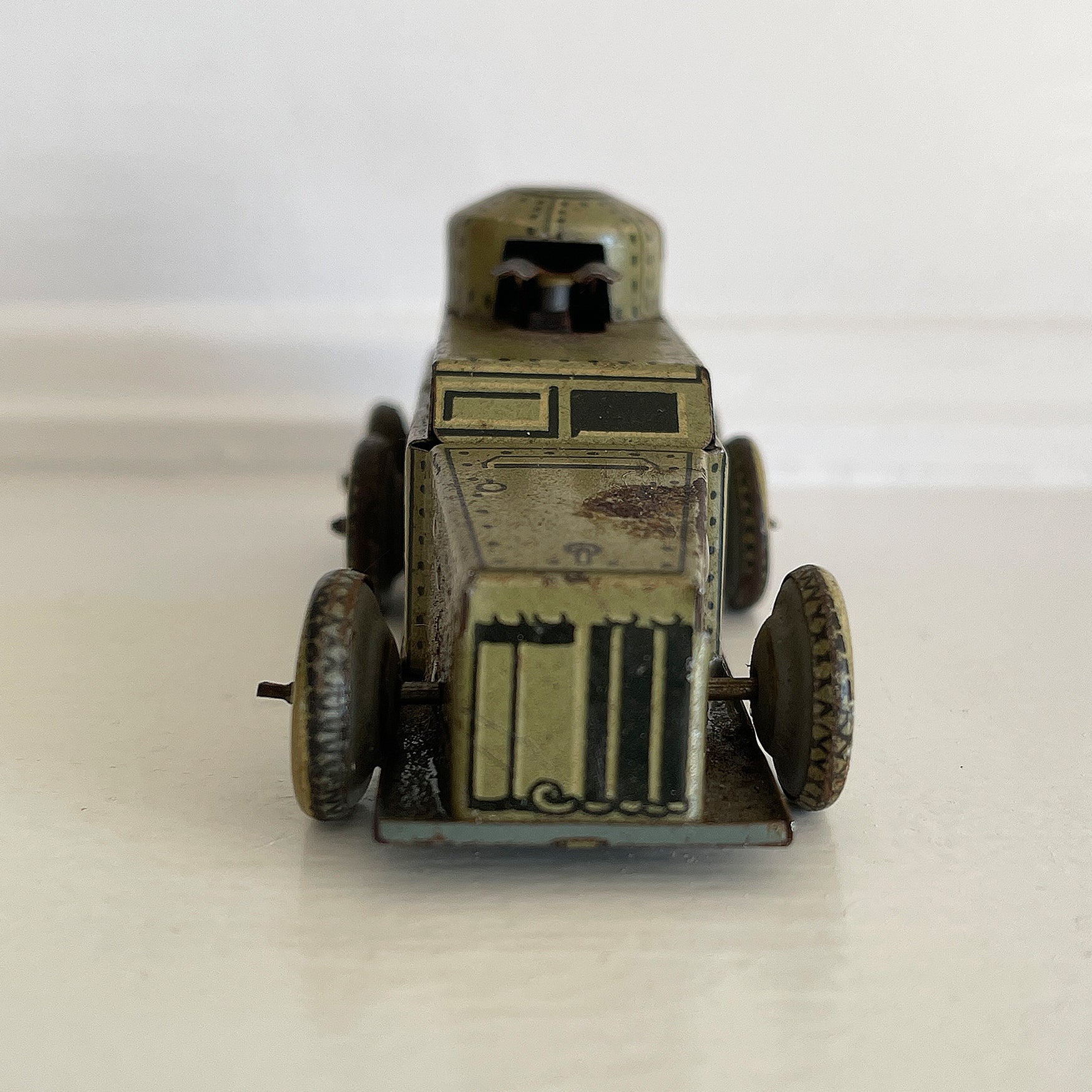 A Cool little Pre-War 1930s Kellerman tin-plate clockwork Panzerspahwagen Armoured Car. It has a clockwork movement, that when wound propels the car forward and shoots bright sparks out of the gun turret. Marked 'D.R.G.M' just under the key hole and 'FOREIGN' above the front wheel - SHOP NOW - www.intovintage.co.uk