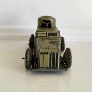 A Cool little Pre-War 1930s Kellerman tin-plate clockwork Panzerspahwagen Armoured Car. It has a clockwork movement, that when wound propels the car forward and shoots bright sparks out of the gun turret. Marked 'D.R.G.M' just under the key hole and 'FOREIGN' above the front wheel - SHOP NOW - www.intovintage.co.uk