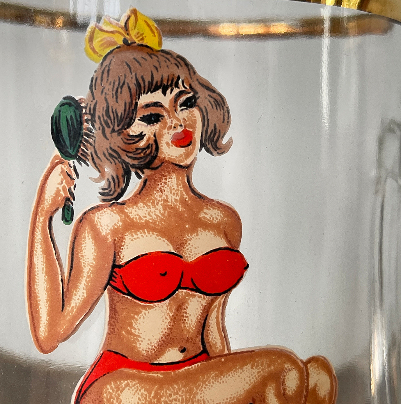A Super Kitsch Vintage Prince William Ware Tankard with a naughty secret! On the front of a glass the young lady is wearing a red bikini sitting on a stool brushing her hair, turn it round and her bikini disappears and she's sitting there in her birthday suit! - SHOP NOW - www.intovintage.co.uk