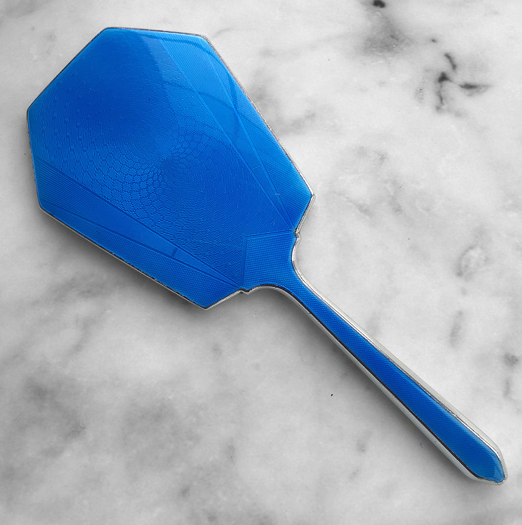 A stunning Vintage Engine Turned Blue Guilloche Enamelled, Chrome Framed Hand Mirror with Bevelled Glass. The beautiful blue enamel is in perfect condition - SHOP NOW - www.intovintage.co.uk