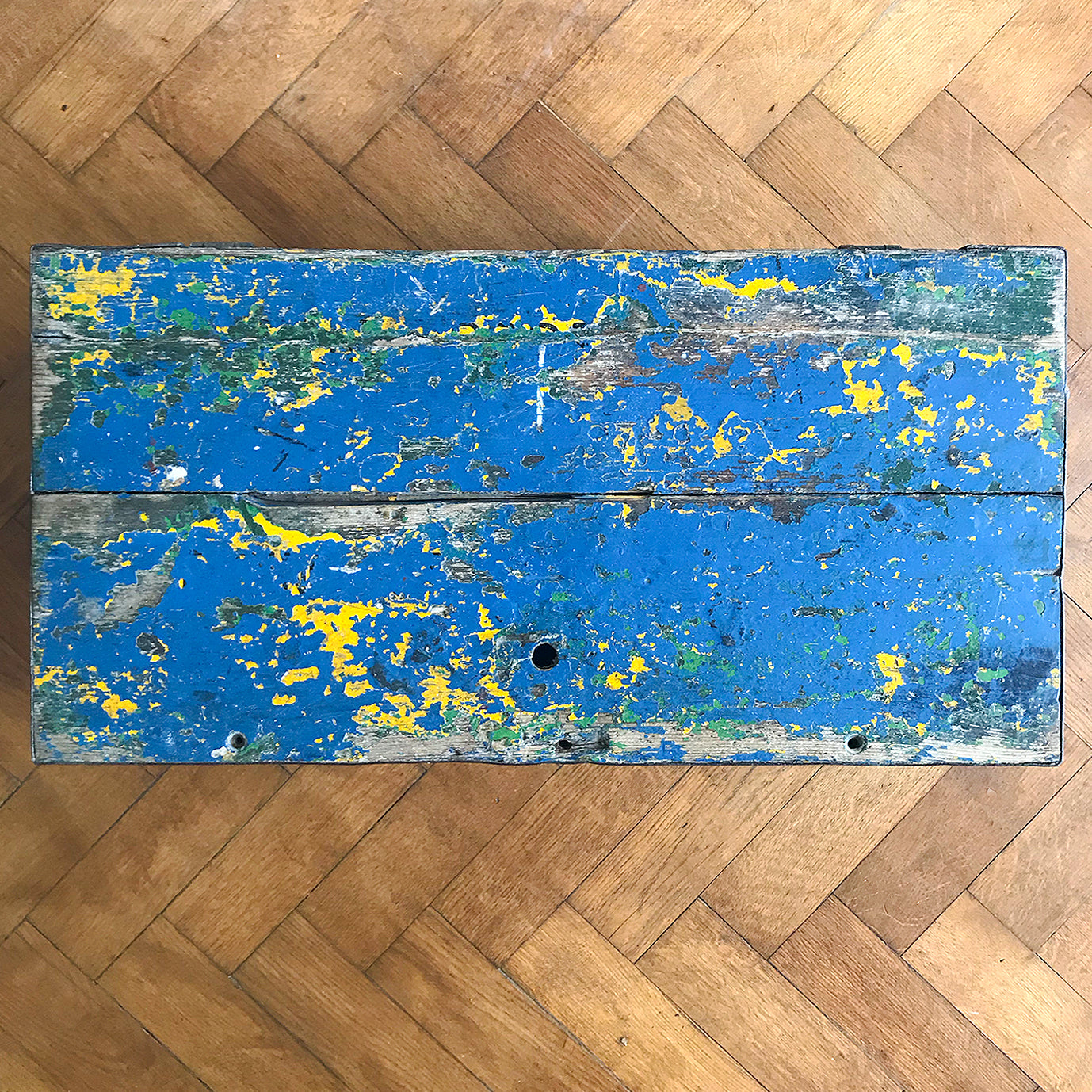 Fantastic Vintage with a wonderful blue distressed painted surface. Sturdy construction with mortice and tenon joints to the corners, it has a latch and two grab handles on the sides. With its fantastic patina this trunk would look fab juxtaposed against a modern clean interior - SHOP NOW - www.intovintage.co.uk