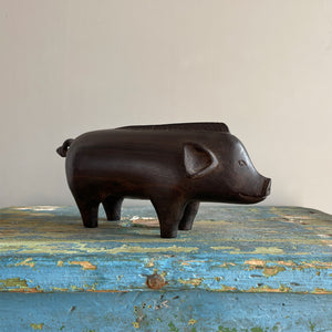 A superb tribal carving of a wild boar. He has a fantastic strong look to him, with a Mohican like mane, super curly tail with snakes head detail carved in. A very fine specimen! SHOP NOW - www.intovintage.co.uk