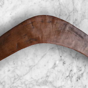 Wonderfully carved Antique Australian Boomerang with amazing naive carving and a beautiful warm colour. On the right side the carved elements include 2 emus, a cockerel, a turkey, a peacock a pea hen and a thistle, whilst on the left side we have a chap smoking a pipe, a knife, a cap, riding boots, pipe, horse, saddle, stirrups, hand cuffs, revolver, and Australian in an army hat. The background has a crosshatch design whilst the edge is finished in a carved dotted pattern - SHOP NOW - www.intovintage.co.uk