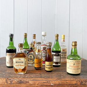 11 mini bottles of vintage Alcohol brands. Not drinkable, but great little display pieces! Brands include Babycham, Smirnoff, Coates & Co, Harvey's, Grants, Booths, Schweppes and Taplow - SHOP NOW - www.intovintage.co.uk