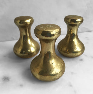 Set of 3 2lb Antique Brass Capstan Bell Weights that have a great patina to their surface. One is marked with the the Royal ER 177 mark on it's base - SHOP NOW - www.intovintage.co.uk
