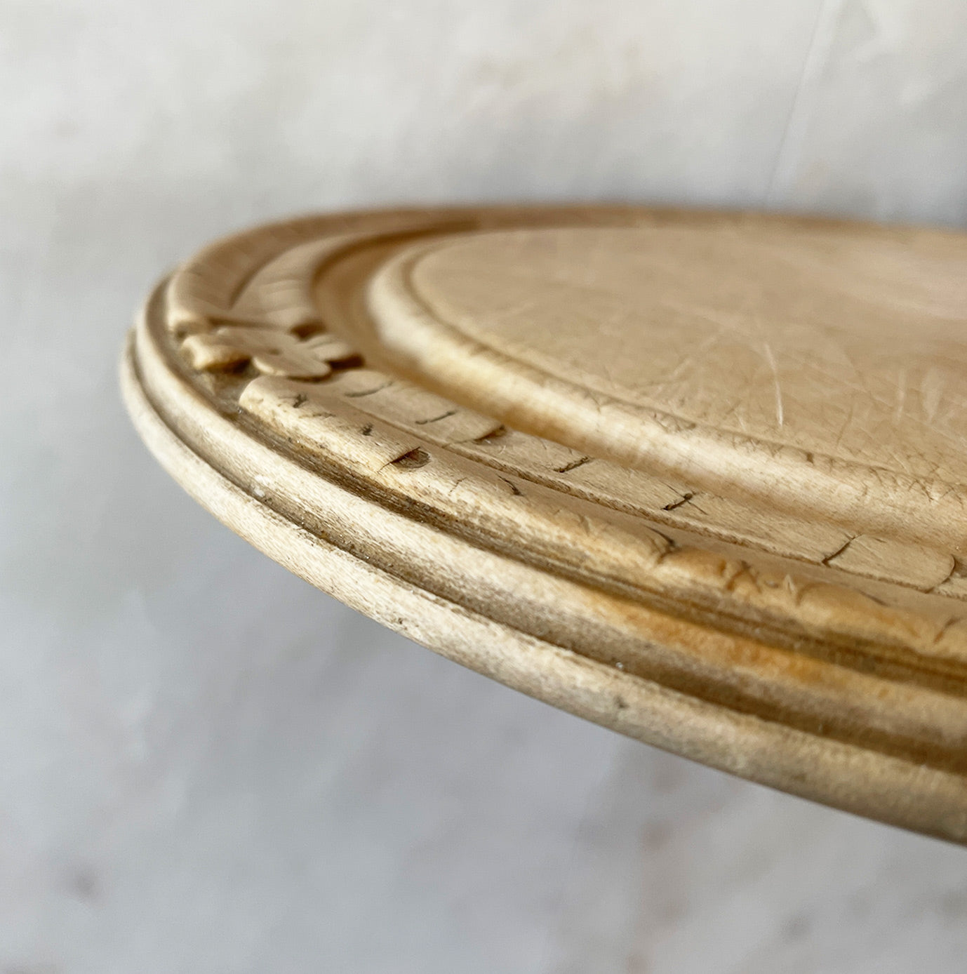 A 20th C Breadboard with pretty clover and leaf carved detail to the edge with a reeded profile. Nice wear to the main board and still nice and flat with no warping - SHOP NOW - www.intovintage.co.uk