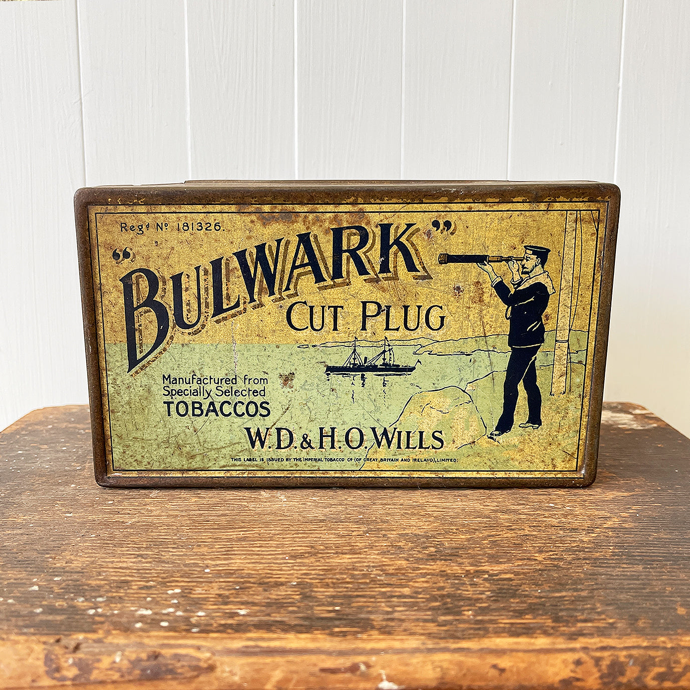 Vintage Bulwark Cut Plug Tobacco Tin from W.D & H.O Wills, that would have held 1LB of tobacco. Great graphics to the front, sides with drilled air holes as part of the tin design. 