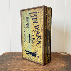 Vintage Bulwark Cut Plug Tobacco Tin from W.D & H.O Wills, that would have held 1LB of tobacco. Great graphics to the front, sides with drilled air holes as part of the tin design. 