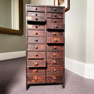 A fantastic set of Watchmakers Draws. Finished in a time worn dark pine, it has 22 draws (descending in size) each one with a wooden turned handle. The draws themselves are individually numbered with a hand painted numeral, with some of them still having their little compartmented areas - SHOP NOW - www.intovintage.co.uk