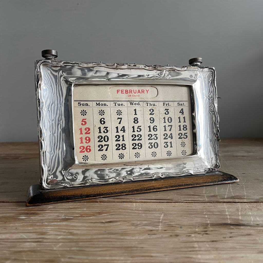 An Antique Silver fronted desk calendar that would look the part on anyone's desk - SHOP NOW - www.intovintage.co.uk