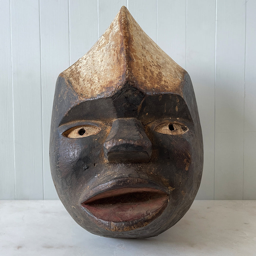 An antique African Mask from the French Cameroon. As a piece of art it has a very cool look with fantastic colour to the mask's surface - SHOP NOW - www.intovintage.co.uk