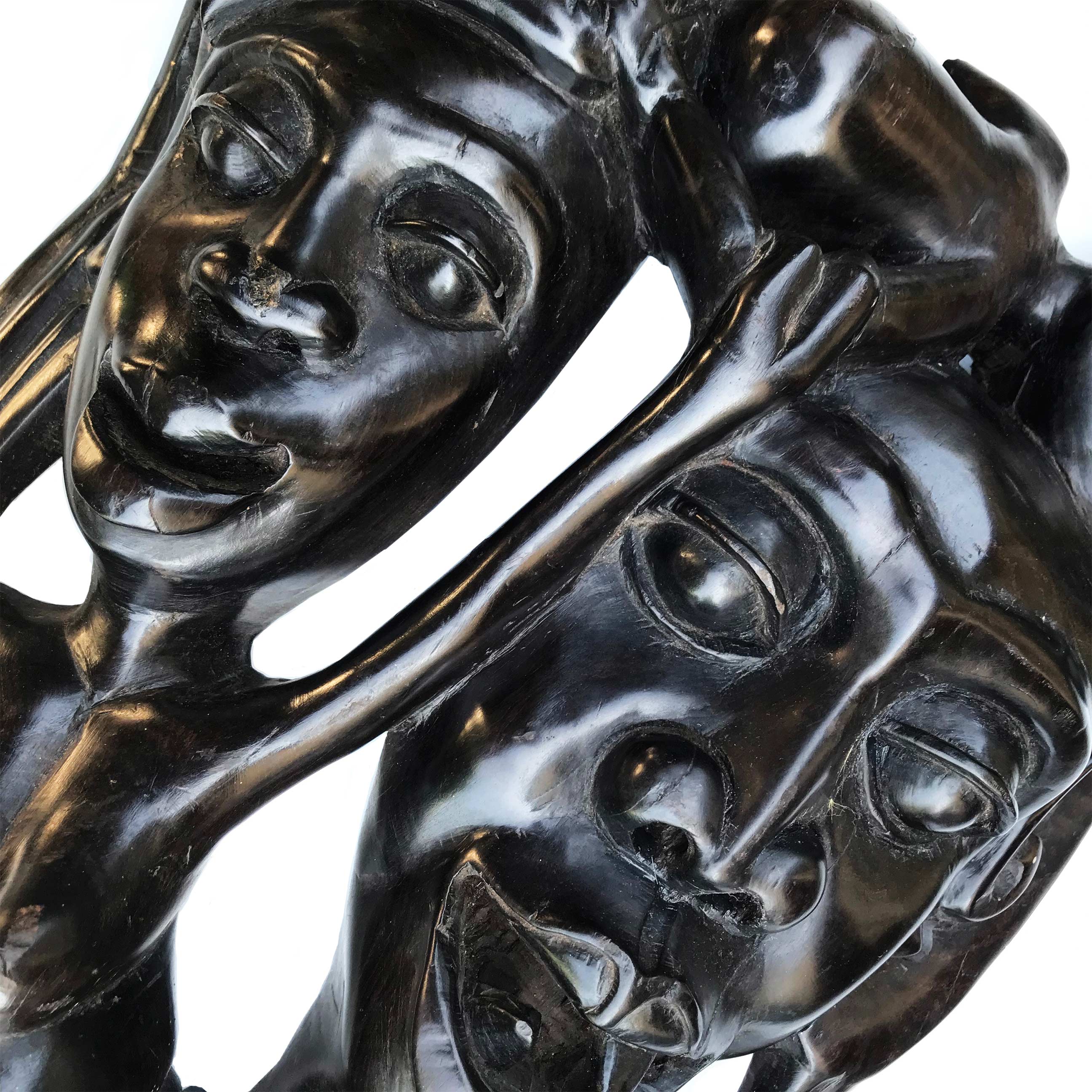 A wonderful Tribal Carving in ebony wood. It has three characterful heads, a man, woman and child. The man has gruesome fangs and long loopy ear lobes! Incredibly detailed and beautifully finished. A solid piece And very heavy - SHOP NOW - www.intovintage.co.uk