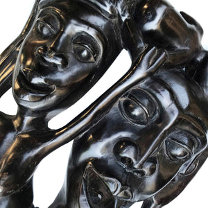 A wonderful Tribal Carving in ebony wood. It has three characterful heads, a man, woman and child. The man has gruesome fangs and long loopy ear lobes! Incredibly detailed and beautifully finished. A solid piece And very heavy - SHOP NOW - www.intovintage.co.uk