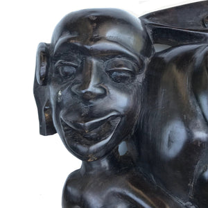 A wonderful Tribal Carving in ebony wood. It has three characterful heads, a man, woman and child. The man has gruesome fangs and long loopy ear lobes! Incredibly detailed and beautifully finished. A solid piece And very heavy - SHOP NOW - www.intovintage.co.uk