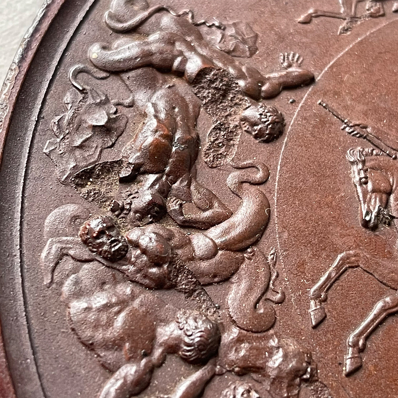 Detailed Victorian Plaster cast of the ancient battle of the Greek Gods and the Gigantes. The plaque shows serpent legged giants in battle whilst in the centre winged female god guides two soldiers on horseback. above them, in his chariot stands Zeus - SHOP NOW - www.intovintage.co.uk