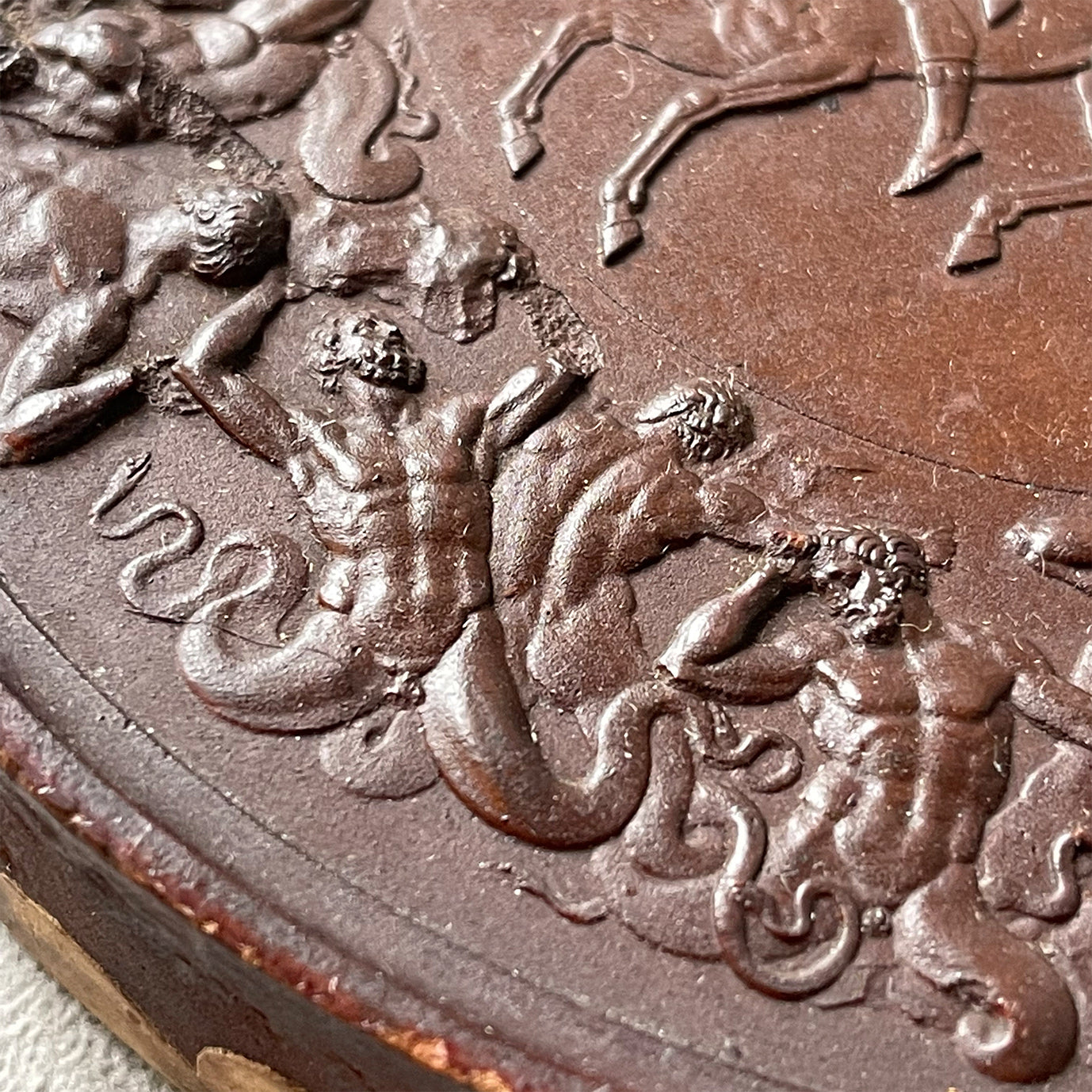 Detailed Victorian Plaster cast of the ancient battle of the Greek Gods and the Gigantes. The plaque shows serpent legged giants in battle whilst in the centre winged female god guides two soldiers on horseback. above them, in his chariot stands Zeus - SHOP NOW - www.intovintage.co.uk
