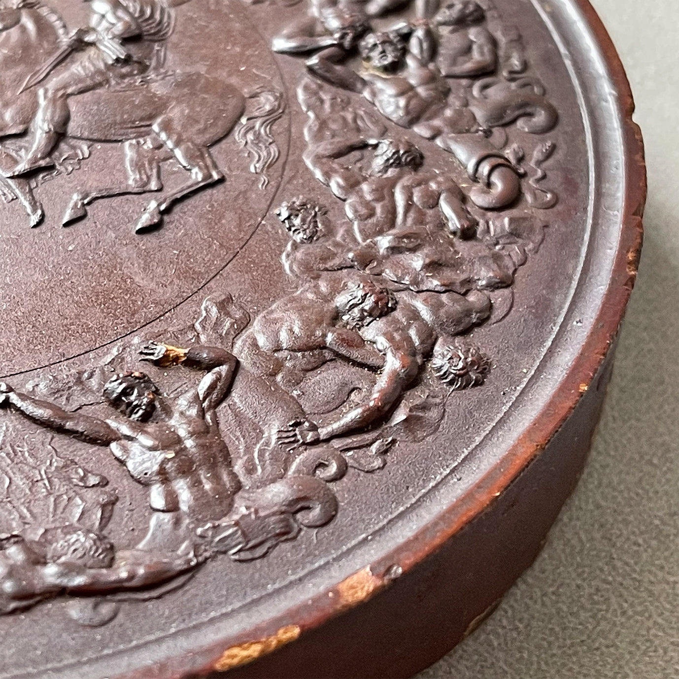 Detailed Victorian Plaster cast of the ancient battle of the Greek Gods and the Gigantes. The plaque shows serpent legged giants in battle whilst in the centre winged female god guides two soldiers on horseback. above them, in his chariot stands Zeus - SHOP NOW - www.intovintage.co.uk