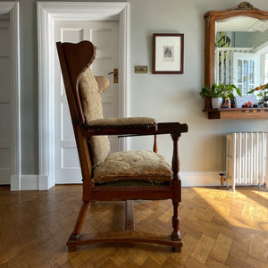 A French Walnut Reclining Armchair Circa 1860. The wing back has seven adjustable positions activated via a simple iron ratchet system. The arms have extendable iron rods. Raised on turned legs with an 'H' shaped stretcher. With original horsehair & ready to be upholstered - SHOP NOW - www.intovintage.co.uk