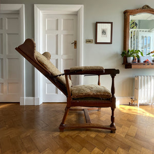 A French Walnut Reclining Armchair Circa 1860. The wing back has seven adjustable positions activated via a simple iron ratchet system. The arms have extendable iron rods. Raised on turned legs with an 'H' shaped stretcher. With original horsehair & ready to be upholstered - SHOP NOW - www.intovintage.co.uk