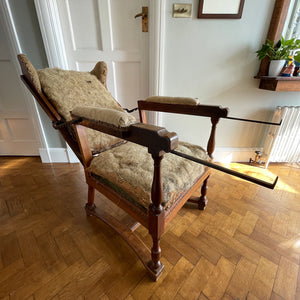 A French Walnut Reclining Armchair Circa 1860. The wing back has seven adjustable positions activated via a simple iron ratchet system. The arms have extendable iron rods. Raised on turned legs with an 'H' shaped stretcher. With original horsehair & ready to be upholstered - SHOP NOW - www.intovintage.co.uk
