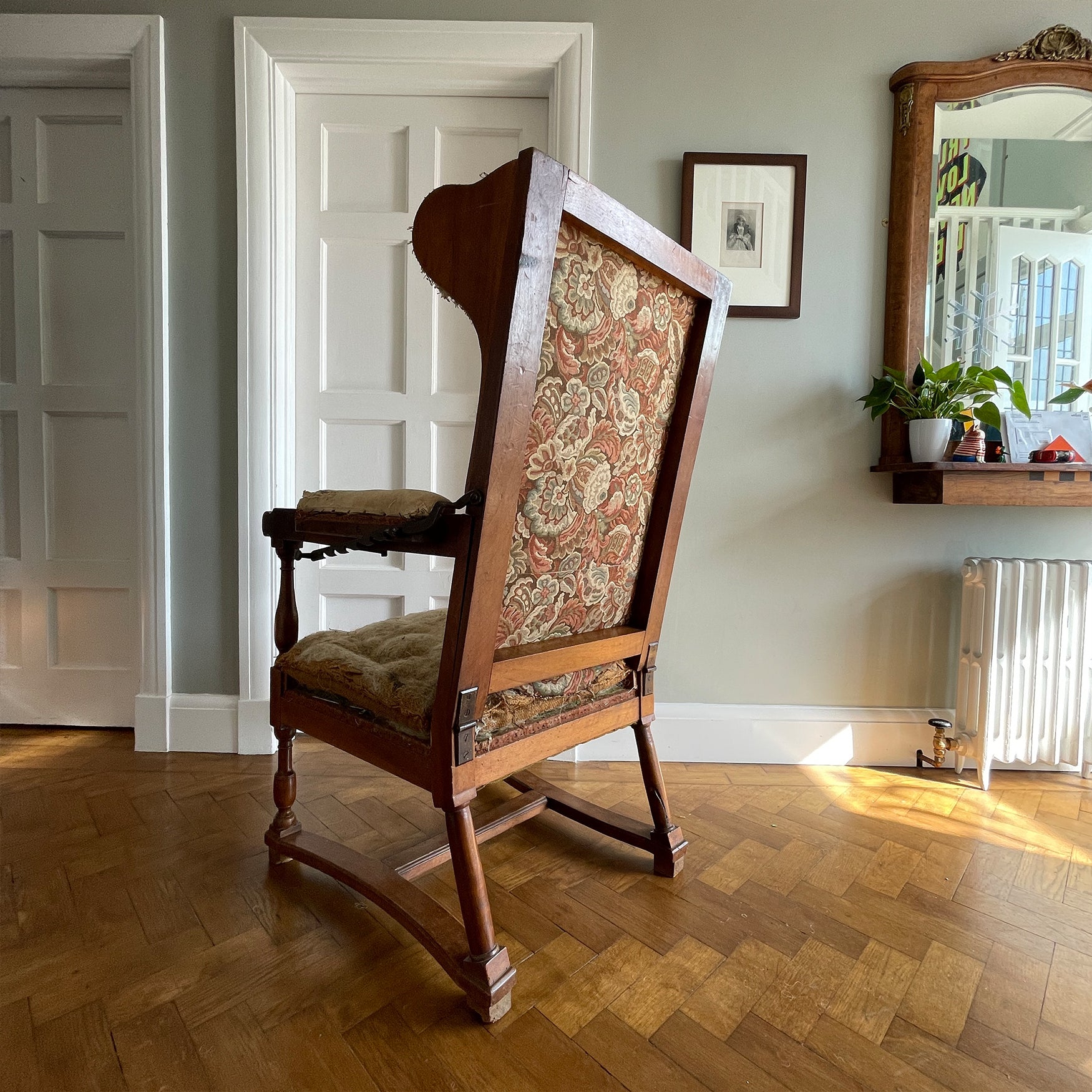 A French Walnut Reclining Armchair Circa 1860. The wing back has seven adjustable positions activated via a simple iron ratchet system. The arms have extendable iron rods. Raised on turned legs with an 'H' shaped stretcher. With original horsehair & ready to be upholstered - SHOP NOW - www.intovintage.co.uk