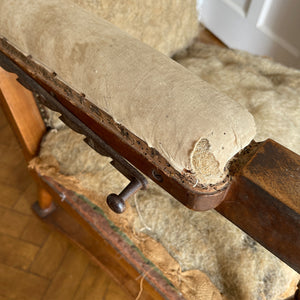 A French Walnut Reclining Armchair Circa 1860. The wing back has seven adjustable positions activated via a simple iron ratchet system. The arms have extendable iron rods. Raised on turned legs with an 'H' shaped stretcher. With original horsehair & ready to be upholstered - SHOP NOW - www.intovintage.co.uk