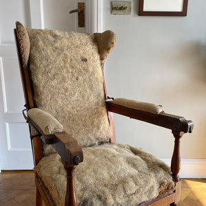 A French Walnut Reclining Armchair Circa 1860. The wing back has seven adjustable positions activated via a simple iron ratchet system. The arms have extendable iron rods. Raised on turned legs with an 'H' shaped stretcher. With original horsehair & ready to be upholstered - SHOP NOW - www.intovintage.co.uk