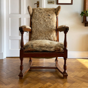 A French Walnut Reclining Armchair Circa 1860. The wing back has seven adjustable positions activated via a simple iron ratchet system. The arms have extendable iron rods. Raised on turned legs with an 'H' shaped stretcher. With original horsehair & ready to be upholstered - SHOP NOW - www.intovintage.co.uk