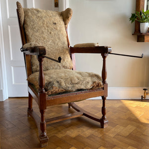 A French Walnut Reclining Armchair Circa 1860. The wing back has seven adjustable positions activated via a simple iron ratchet system. The arms have extendable iron rods. Raised on turned legs with an 'H' shaped stretcher. With original horsehair & ready to be upholstered - SHOP NOW - www.intovintage.co.uk