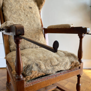 A French Walnut Reclining Armchair Circa 1860. The wing back has seven adjustable positions activated via a simple iron ratchet system. The arms have extendable iron rods. Raised on turned legs with an 'H' shaped stretcher. With original horsehair & ready to be upholstered - SHOP NOW - www.intovintage.co.uk
