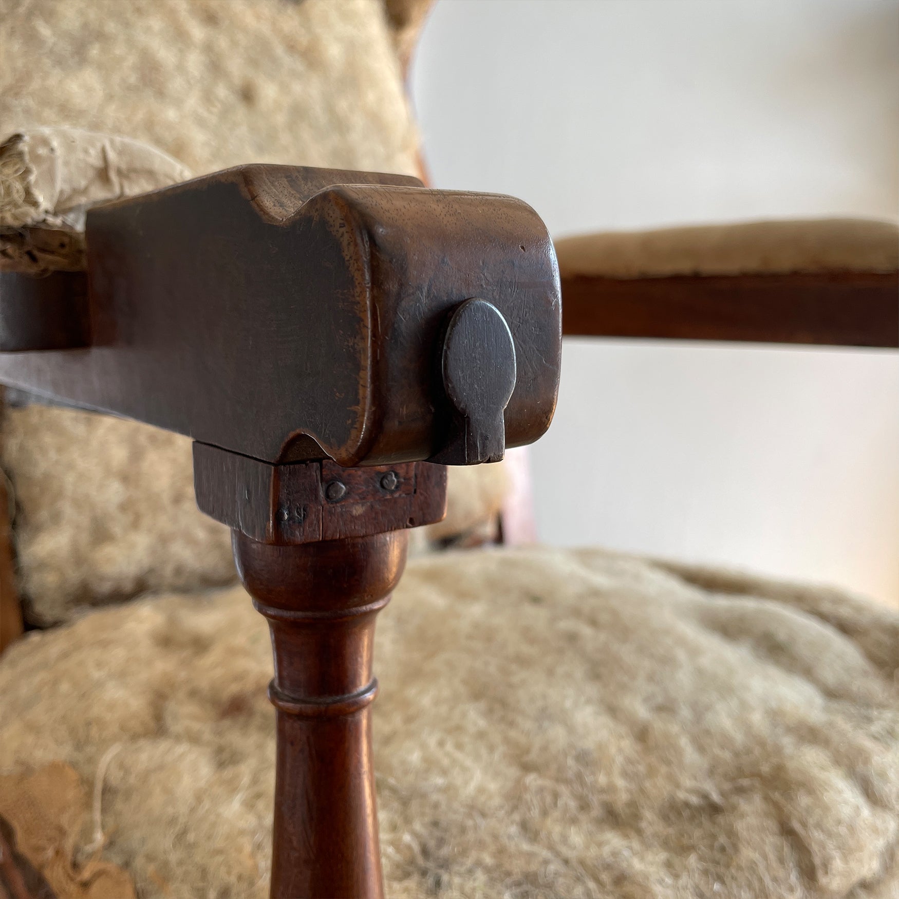 A French Walnut Reclining Armchair Circa 1860. The wing back has seven adjustable positions activated via a simple iron ratchet system. The arms have extendable iron rods. Raised on turned legs with an 'H' shaped stretcher. With original horsehair & ready to be upholstered - SHOP NOW - www.intovintage.co.uk