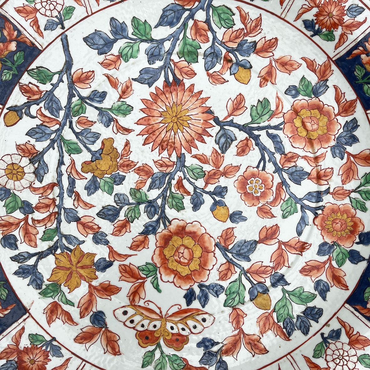 A large Oriental Charger Plate with colourful hand painted depictions of Chrysanthemum flowers and Butterfly. Decoration of flowers and signed to the underside. DIMENSIONS 47cm (Circumference) - SHOP NOW - www.intovintage.co.uk