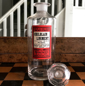 Vintage Apothecary Bottle with an original paper Poison label for Chilblain Liniment, Poison from Hedley E. Dwelly, High-Class Drug Stores, 41, Acton Lane, Harlesden. N.W. London - SHOP NOW - www.intovintage.co.uk