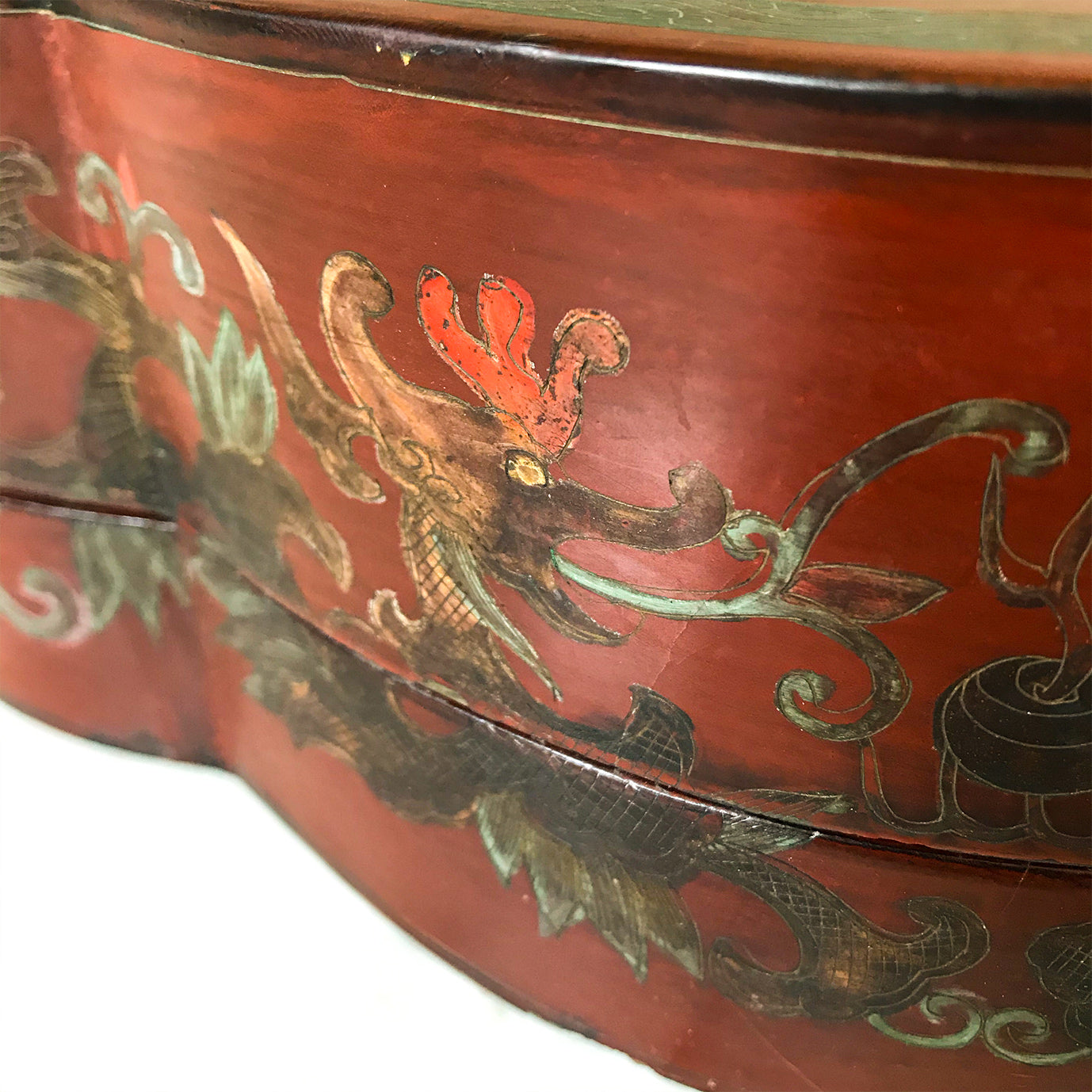 Chinese Red Lacquered Papier Mache Marriage Box. The box is decorated with Dragons & pheasants, a sign of good luck for the married couple. Gilt detail with the sides having an unusual scolloped shape adding to its country house look - SHOP NOW - www.intovintage.co.uk