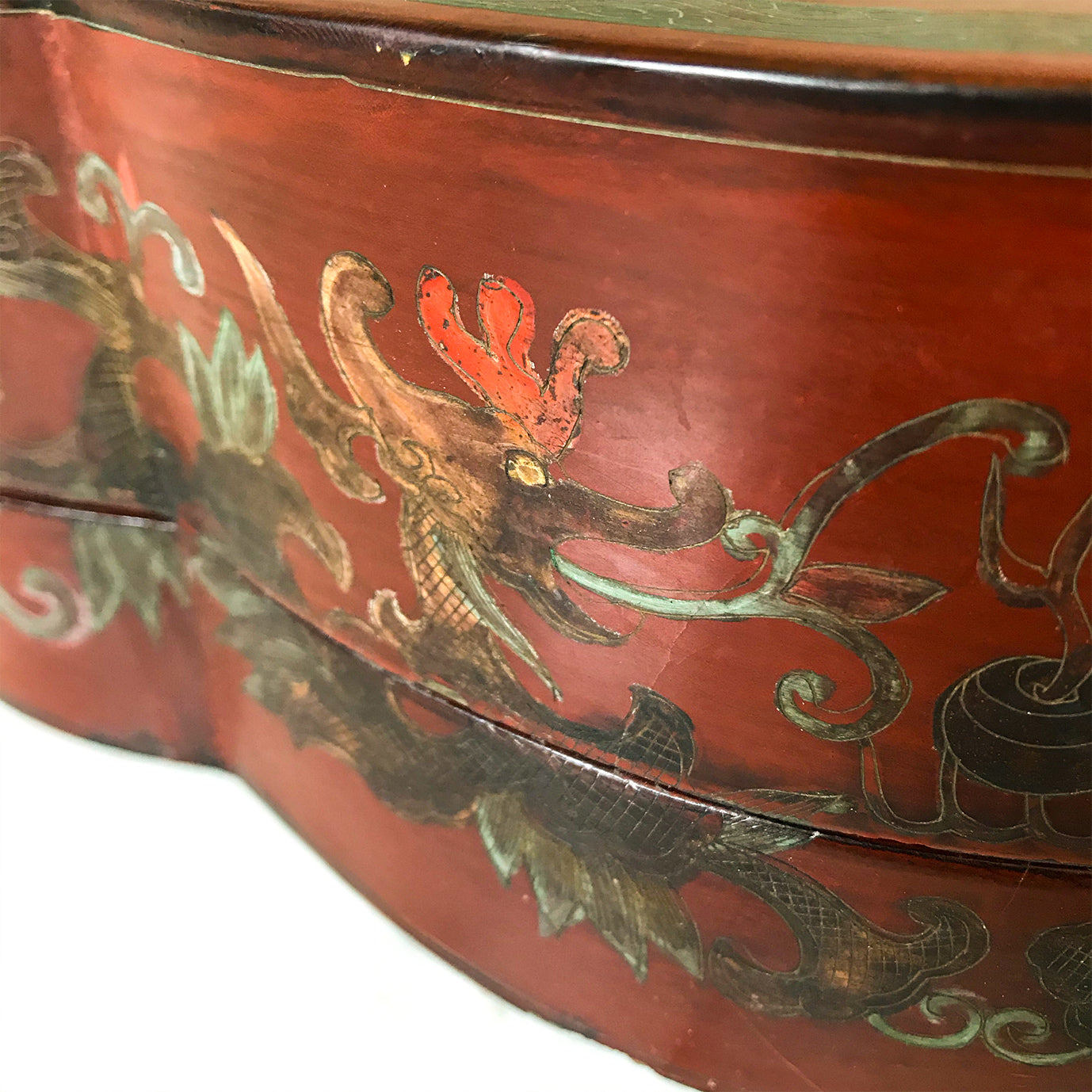 Chinese Red Lacquered Papier Mache Marriage Box. The box is decorated with Dragons & pheasants, a sign of good luck for the married couple. Gilt detail with the sides having an unusual scolloped shape adding to its country house look - SHOP NOW - www.intovintage.co.uk