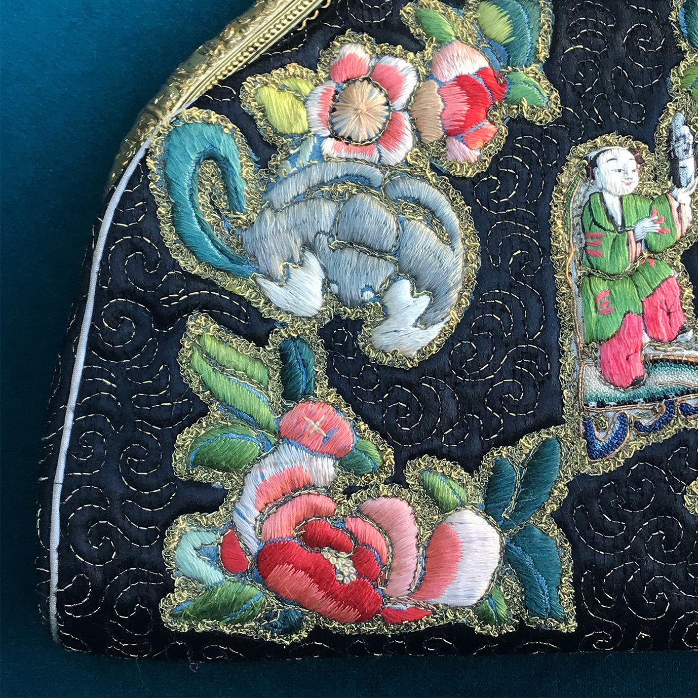 Exquisitely embroidered Vintage Chinese Silk Handbag with golden clasp in the most amazing original condition. The main body of the black bag is hand embroidered with a central silk Chinese figure surrounded by stylised embroidered silk dragons and flowers. It comes with its original silk purse and silk and kid leather lined mirror - SHOP NOW - www.intovintage.co.uk