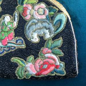Exquisitely embroidered Vintage Chinese Silk Handbag with golden clasp in the most amazing original condition. The main body of the black bag is hand embroidered with a central silk Chinese figure surrounded by stylised embroidered silk dragons and flowers. It comes with its original silk purse and silk and kid leather lined mirror - SHOP NOW - www.intovintage.co.uk