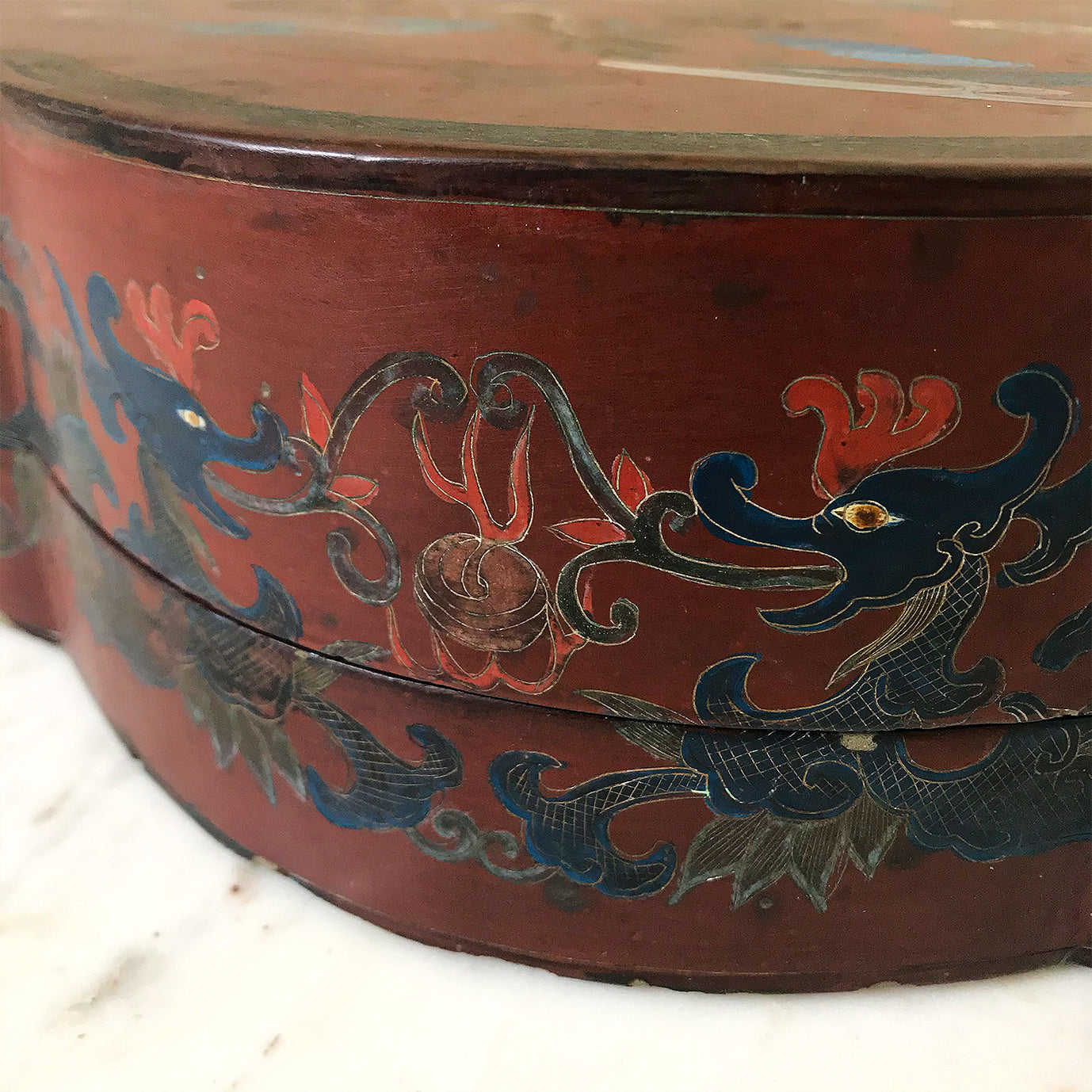 Chinese Red Lacquered Papier Mache Marriage Box. The box is decorated with Dragons & pheasants, a sign of good luck for the married couple. Gilt detail with the sides having an unusual scolloped shape adding to its country house look - SHOP NOW - www.intovintage.co.uk