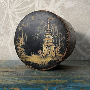 A delightful Oriental wooden Trinket box with lid. Decorated with a Pagoda scene to the lid, with the side having a floral fern decoration. The inside sees a brick red finish with flecks of gold. Great wear to the black paint around the edges on the outside - SHOP NOW - www.intovintage.co.uk