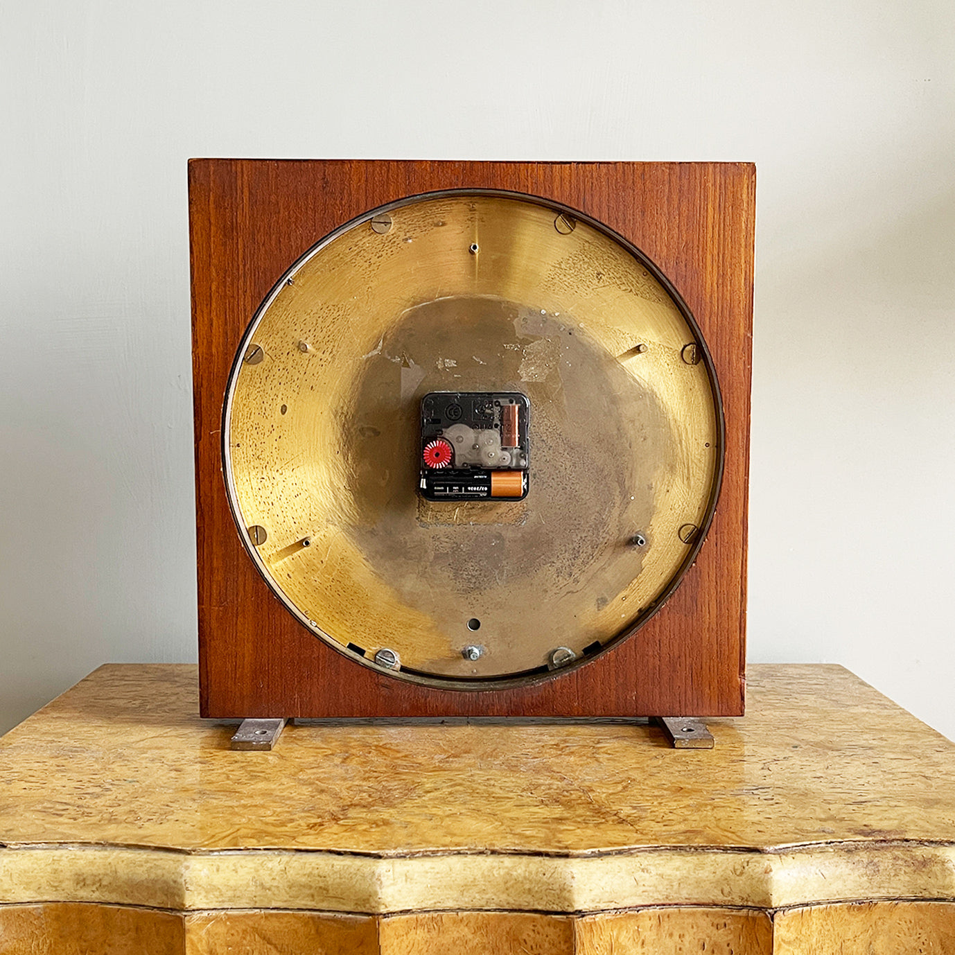 An impressive mid 20th Century World Timer mantel or table clock by Kienzle, Germany with the very rare teak wood surround. The face depicts the countries of the world showing the different time zones - SHOP NOW - www.intovintage.co.uk