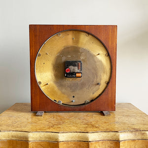 An impressive mid 20th Century World Timer mantel or table clock by Kienzle, Germany with the very rare teak wood surround. The face depicts the countries of the world showing the different time zones - SHOP NOW - www.intovintage.co.uk