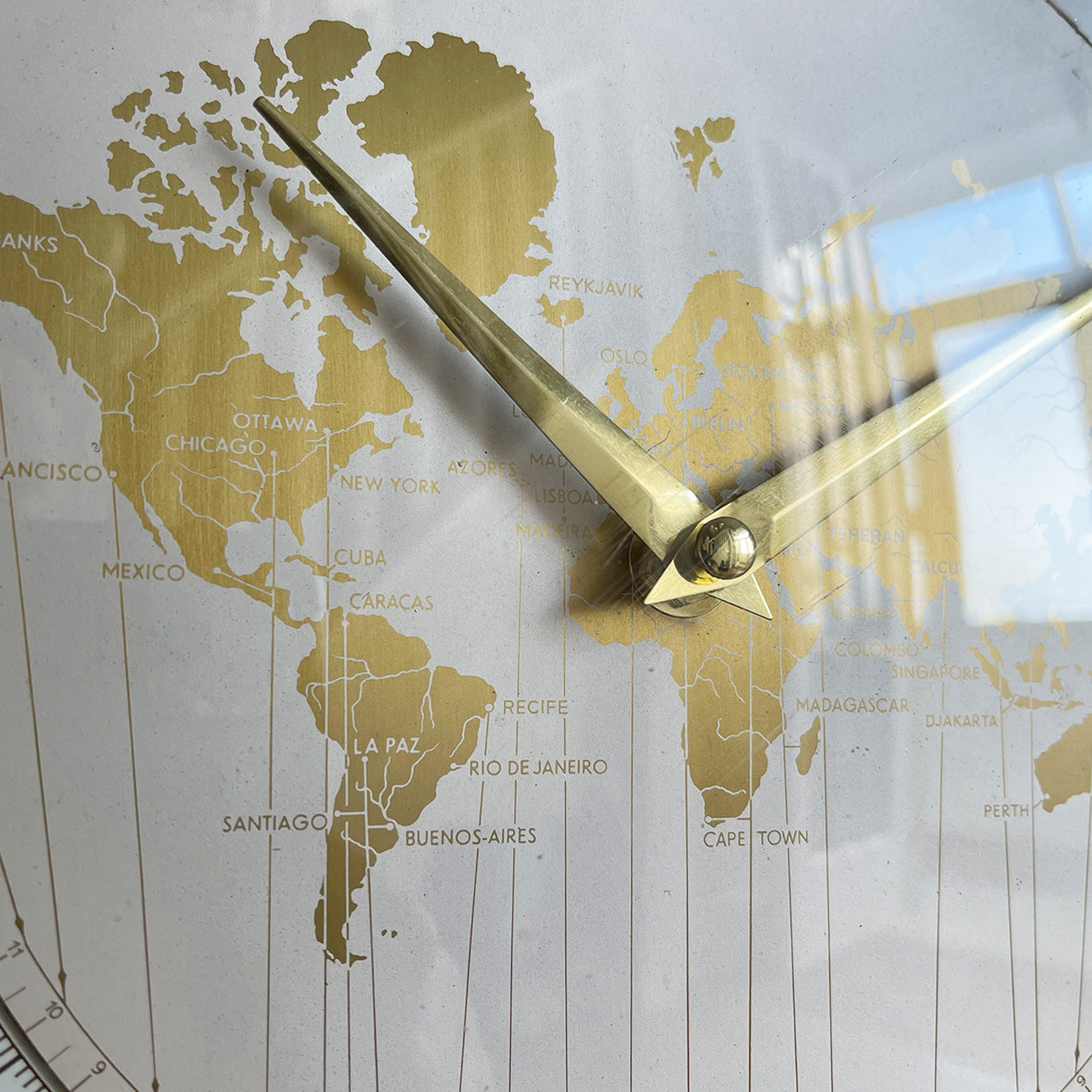 An impressive mid 20th Century World Timer mantel or table clock by Kienzle, Germany with the very rare teak wood surround. The face depicts the countries of the world showing the different time zones - SHOP NOW - www.intovintage.co.uk