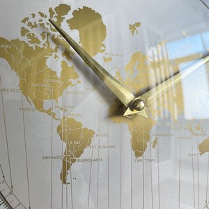 An impressive mid 20th Century World Timer mantel or table clock by Kienzle, Germany with the very rare teak wood surround. The face depicts the countries of the world showing the different time zones - SHOP NOW - www.intovintage.co.uk