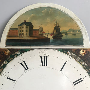 Beautiful Antique Clock Face by Johnson of Knaresboro. It has a charming harbour scene with a couple strolling along a period waterside quay and two naval frigates in full sail showing the Royal Navy flag - SHOP NOW - www.intovintage.co.uk